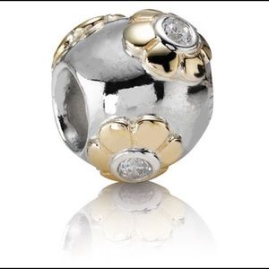Retired Pandora two-tone Flower Bead Charm in Gold and Silver